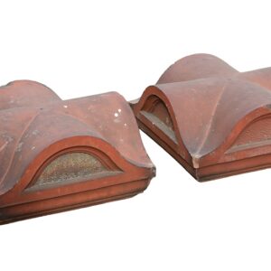 A pair of well weathered Victorian terracotta pier caps, showing a fabulous patina of lichen and organic discolouration.