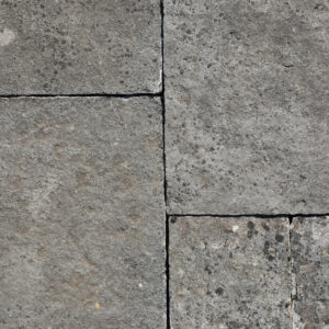 Reclaimed and weathered limestone paving in a classic blue/buff colour and showing highly desirable aged patina