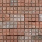 A collection of uncommon, weathered red stable pavers showing a fine patina of surface wear and discolouration