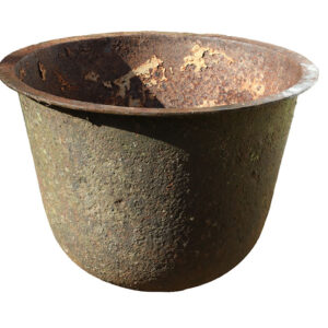 An antique cast iron wash boiler with a textured patina that's perfect for garden planter or water feature