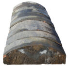 Reclaimed Staffordshire blue domed wall copings with a weathered patina and remnants of mortar from previous use