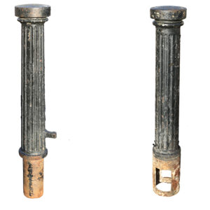 A reclaimed set of 10 cast iron fluted bollards with both removable and fixed items and an authentic aged patina of flaking black pint and surface corrosion