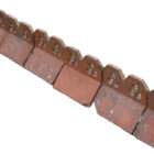 A short run of 12 reclaimed double trefoil crested ridge tiles showing light patina of lichen and minor environmental discolouration