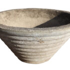 A beautifully weathered reclaimed concrete tapered planter showing a fine aged patina