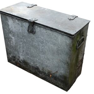 A weathered and reclaimed galvanised feed store with an aged patina of discoloration, algae and general oxidisation.