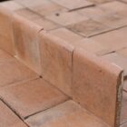 A short run of heather brown bullnose skirting quarry tiles from the Dennis Ruabon Hafodex range, with minor colour variation