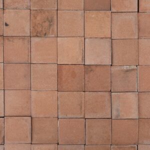A wide spread of reclaimed 4 inch Heather Brown quarry tiles from the Dennis Ruabon Hafodex range, showing minor variation in colour and an aged patina of minimal edge wear and remnants of mortar.