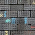 A batch of reclaimed Staffordshire blue pavers with a unique patina and a mix of two similar styles of 18 spot surface