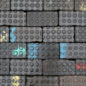 A batch of reclaimed Staffordshire blue pavers with a unique patina and a mix of two similar styles of 18 spot surface