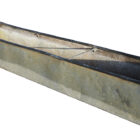 A reclaimed galvanised cattle trough with a weathered patina that makes a perfect water feature or wide planter