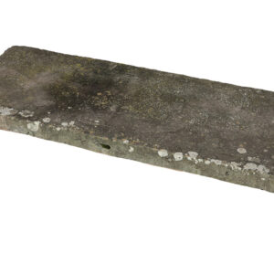 A large single slab of Yorkstone making an impressive bench top or step, with an authentic aged patina